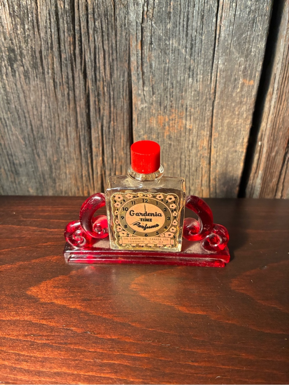 Vintage Mini “Gardenia Time” Perfume bottle — Art Deco Clock Red Plastic Scroll